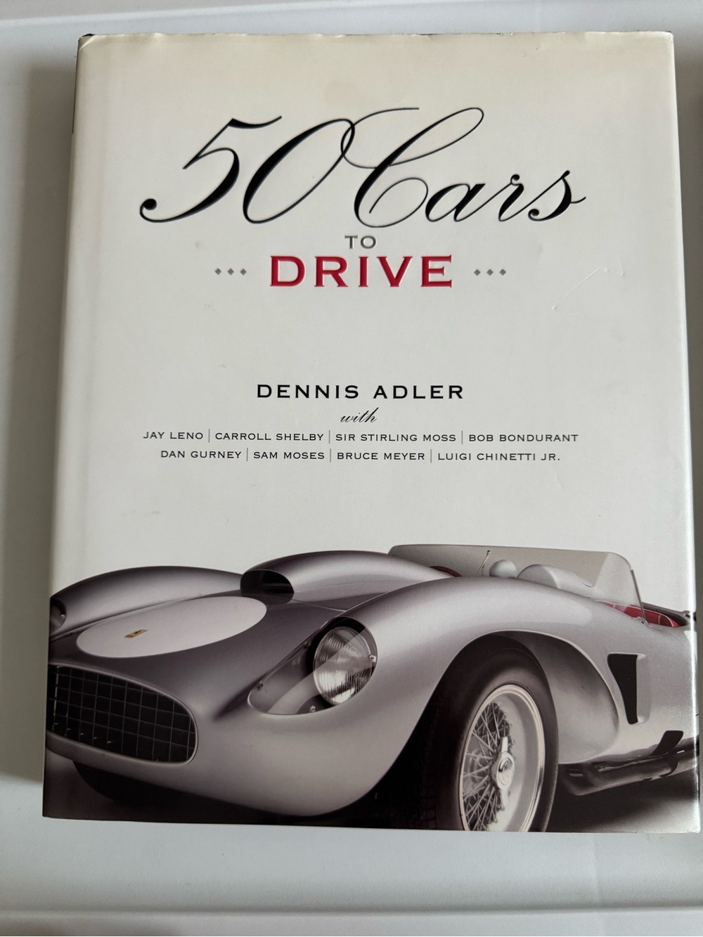 50 Cars to Drive Hardcover Coffee table book